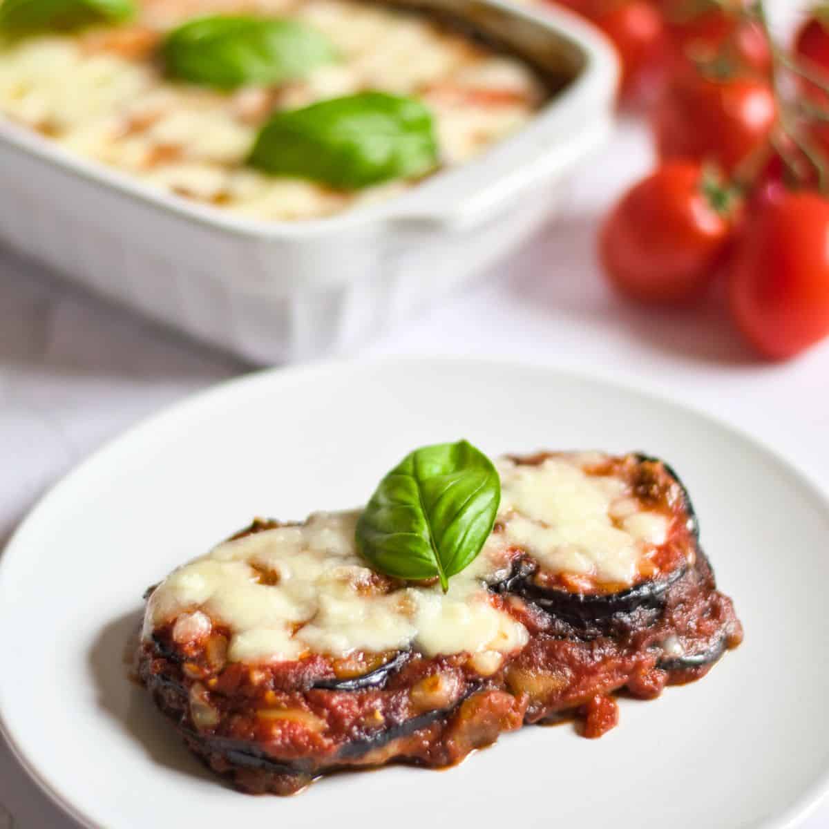 Baked Eggplant Parmesan Without Breadcrumbs Recipe on a white plate.