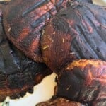 Quick low carb grilled and marinated portobello mushrooms on a white plate.