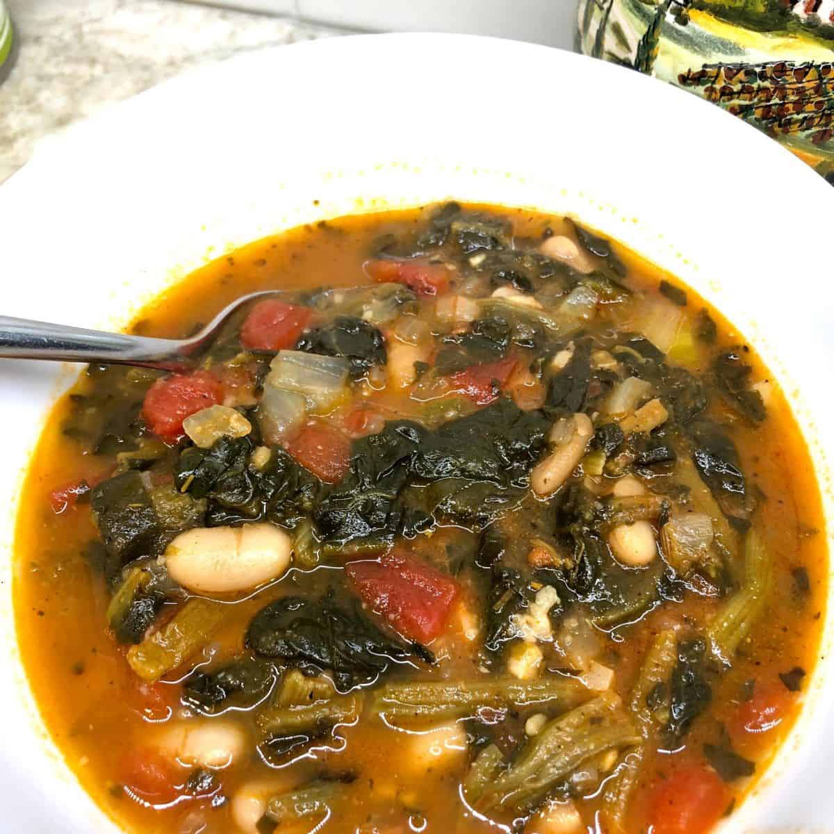 classic ribollita soup in a white bowl.