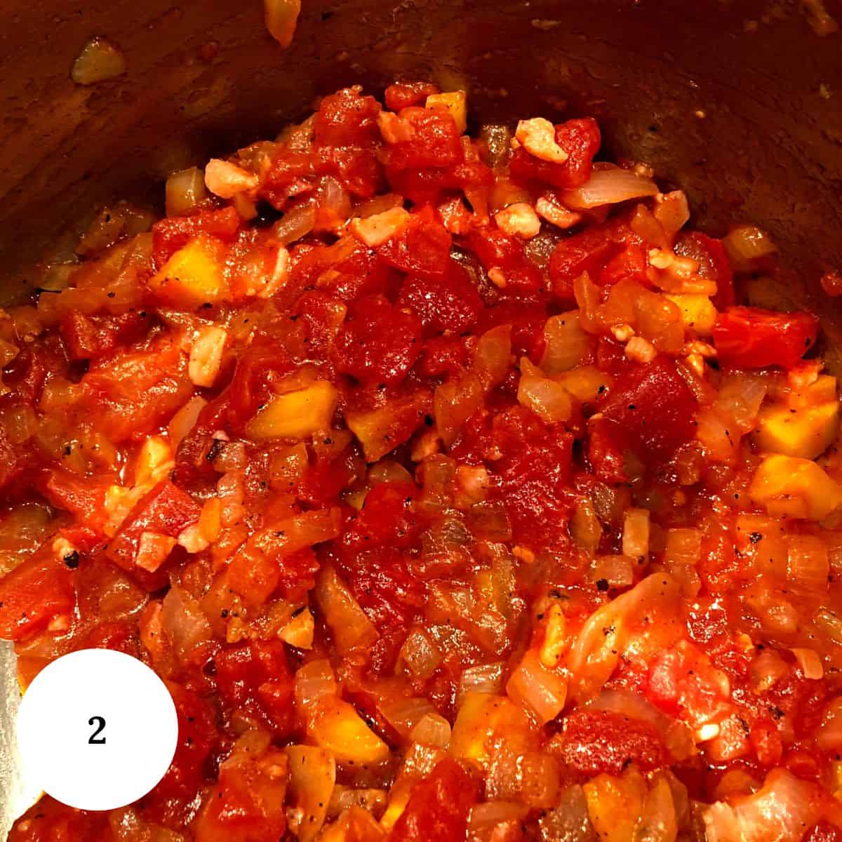 adding in tomato paste to the mixture