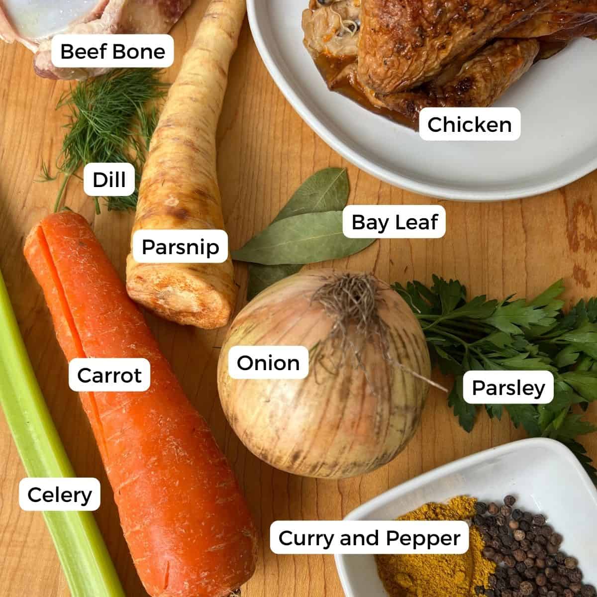 Ingredients for bone broth include chicken, beef bone, celery, carrots, onion, parsnip and spices.