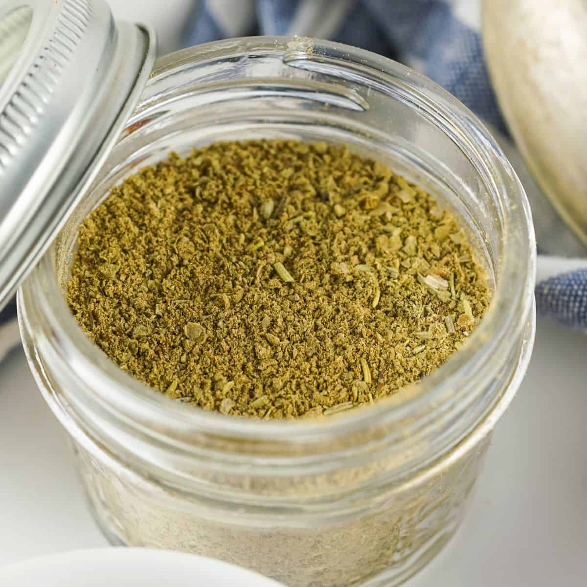 homemade poultry seasoning in a clear jar