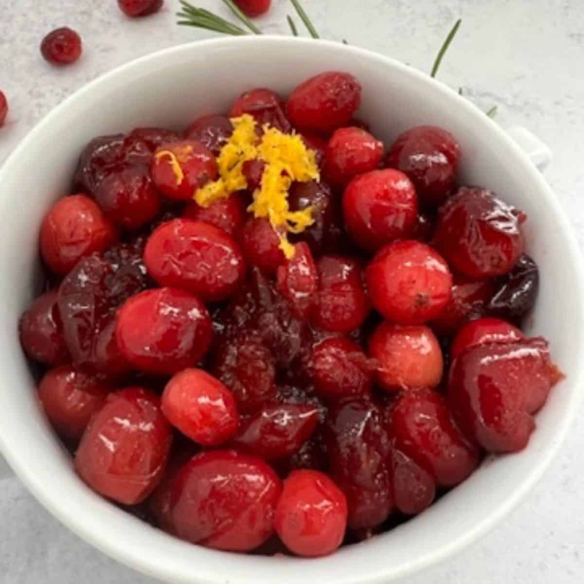 Cranberry sauce in a white bowl. 