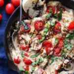 caprese dip in a black bowl