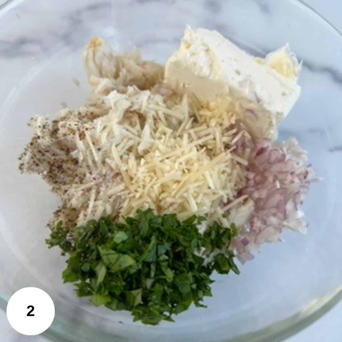 The stuffing ingredients in a clear bowl. 