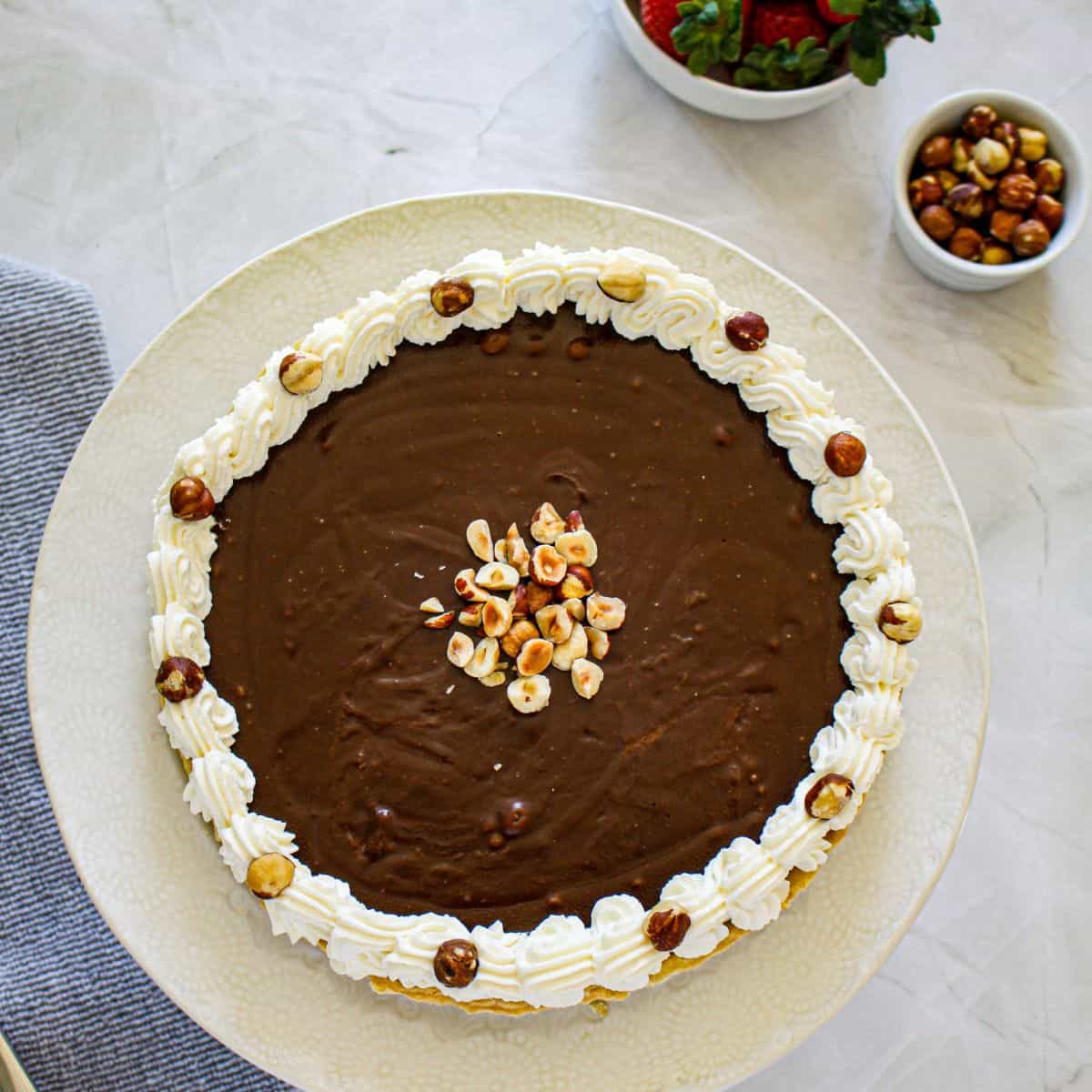 Simple Nutella Pie on a white plate.