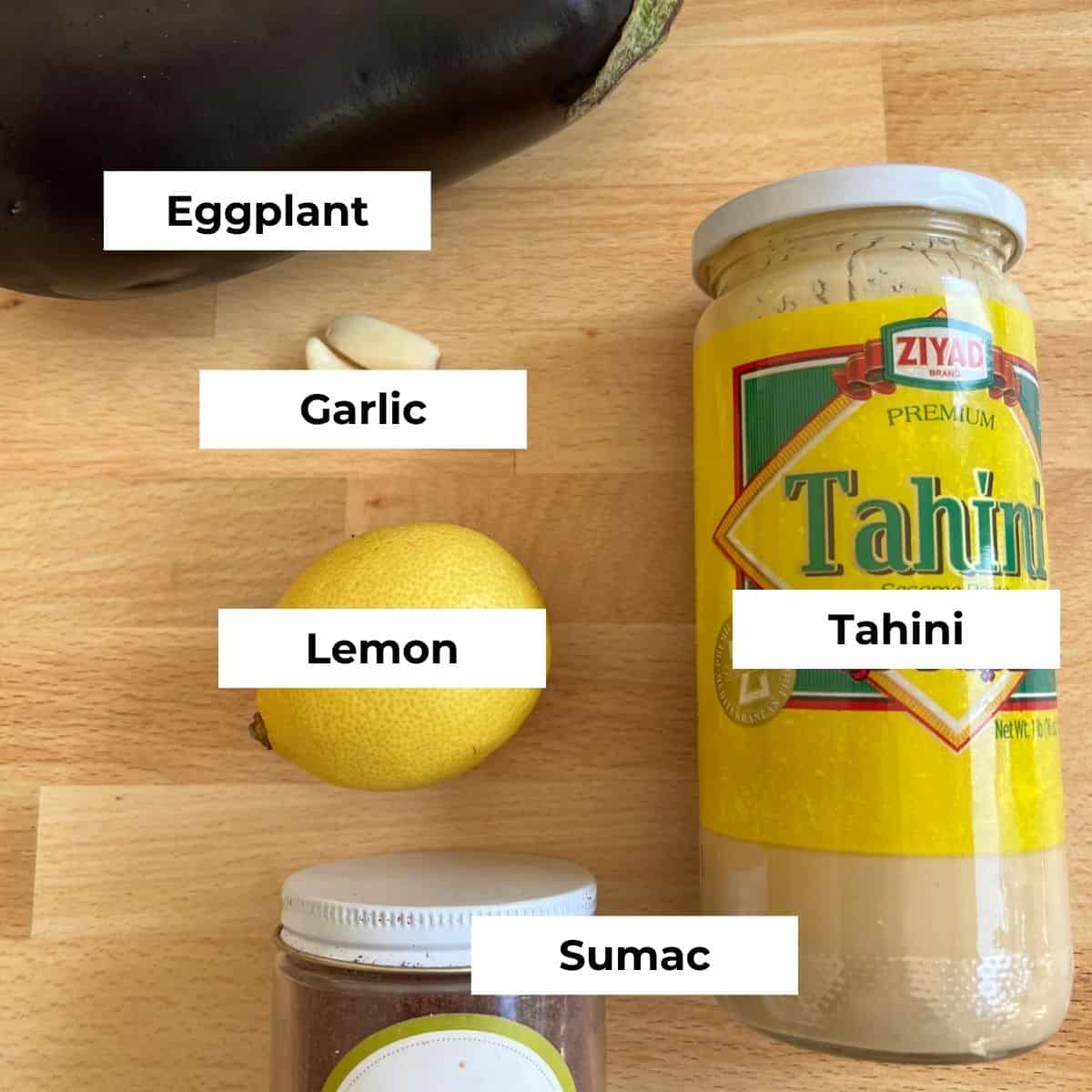 Ingredients include eggplant, tahini, sumac, garlic, and lemon. 