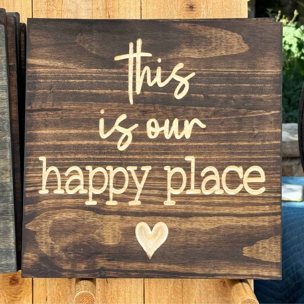 A sign that says "this is our happy place".