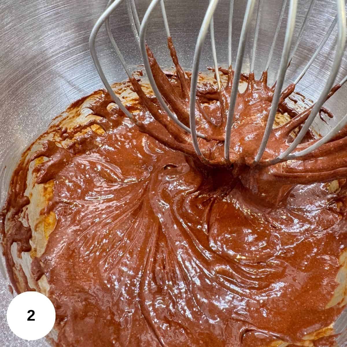 Mixed the chocolate in with the egg yolks creating a chocolate batter. 