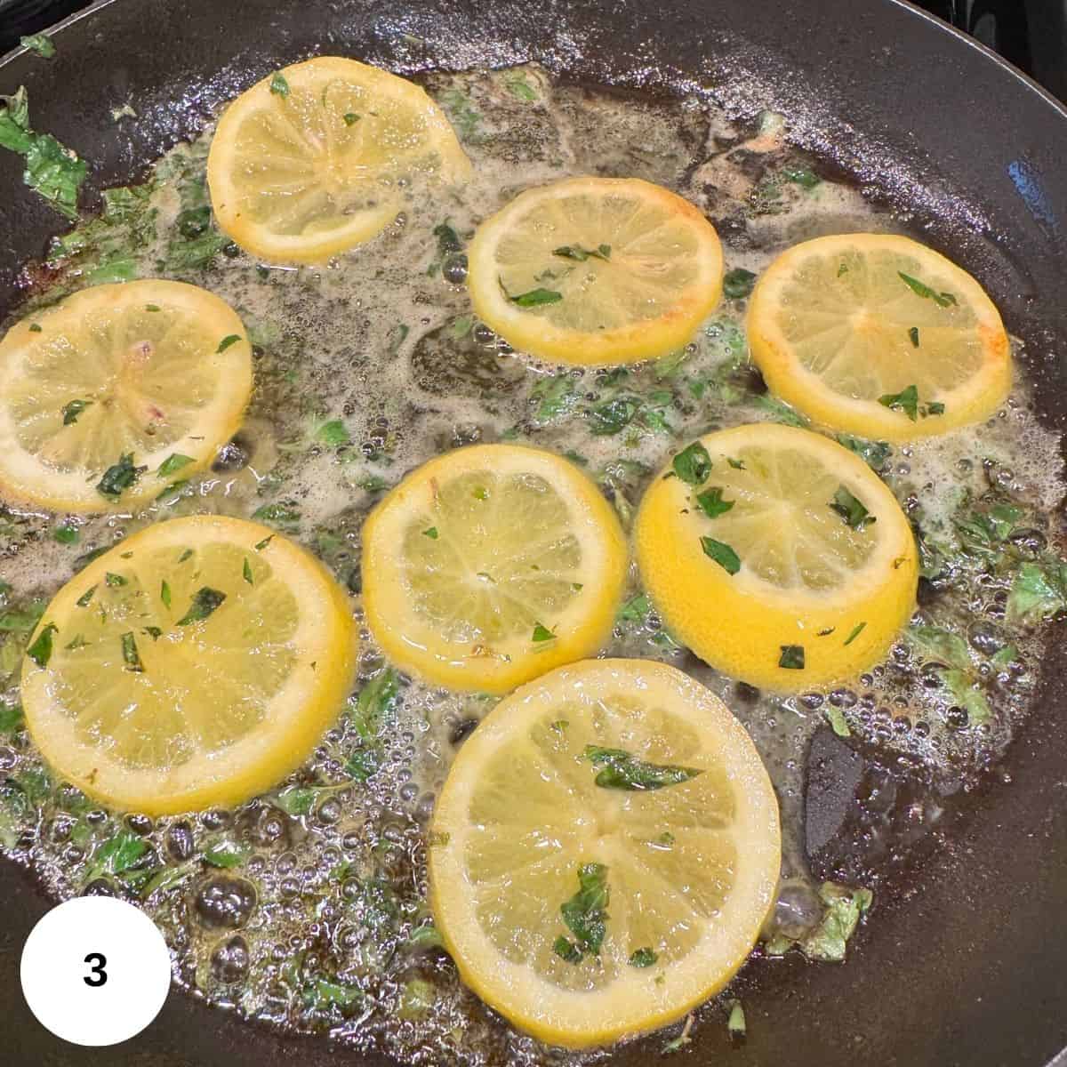 Finishing the sauce by sauteeing lemons and oregano. 