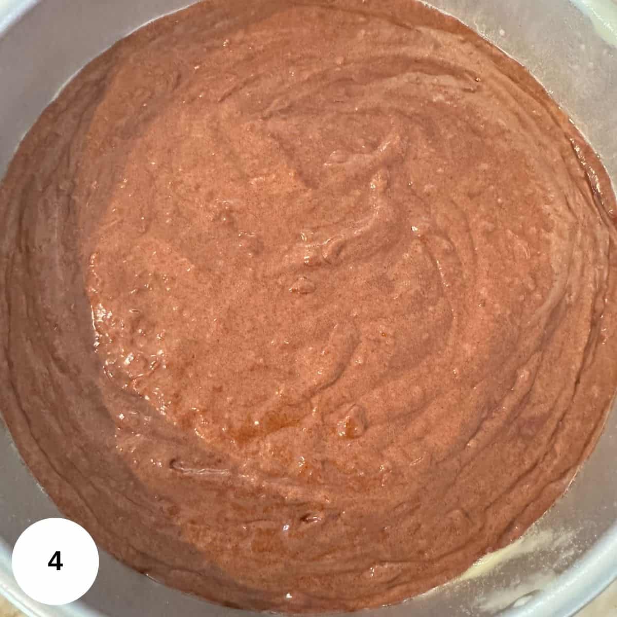 Poured the cake into the prepared cake pan. 