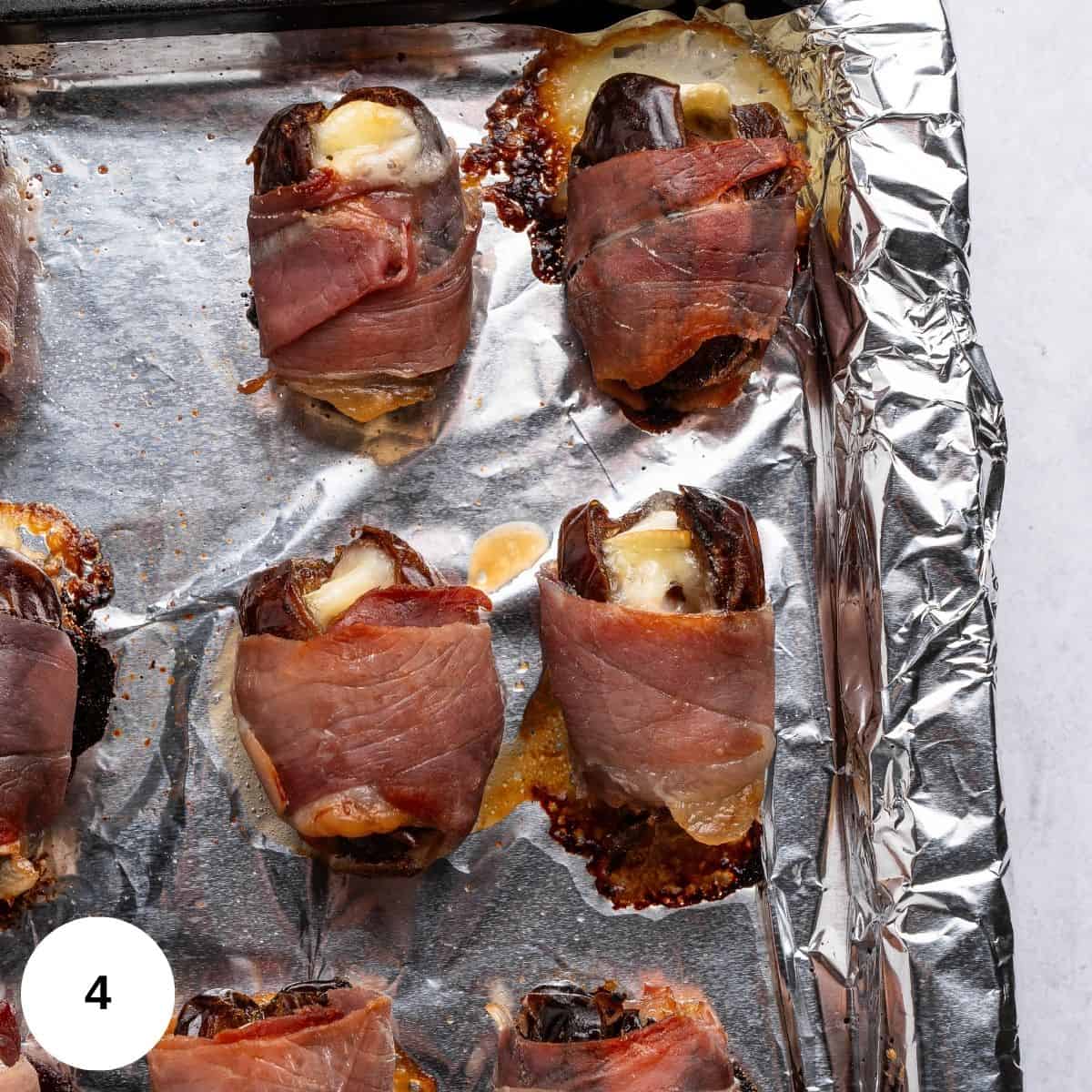 Baked dates on a baking sheet. 
