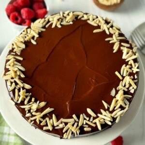 Chocolate Almond Torte on a white cake plate.