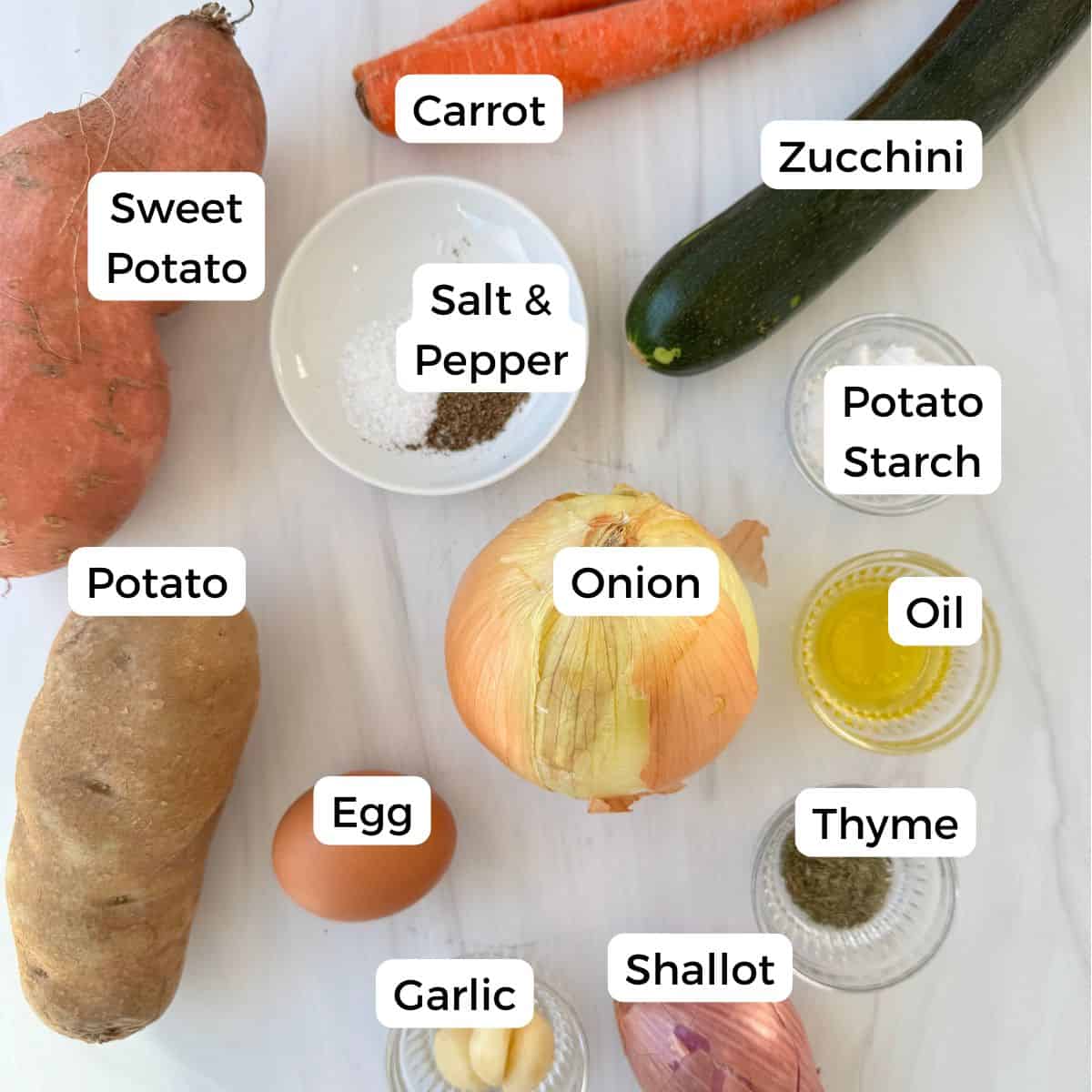 Ingredients include potato, sweet potato, carrot, zucchini, salt, pepper, potato starch, onion, oil, thyme, shallot, garlic, and egg. 