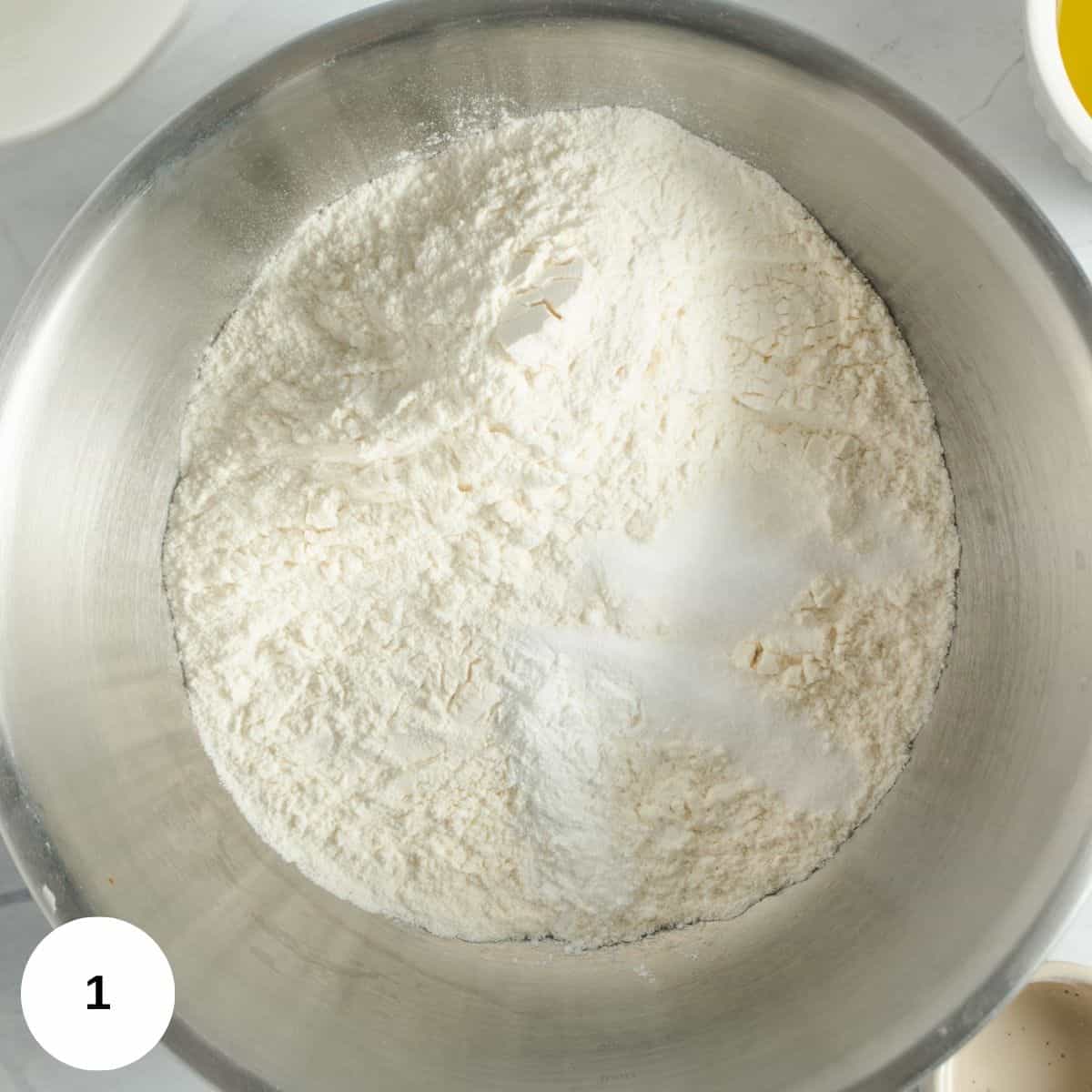 Combining the dry ingredients in a bowl and setting aside.