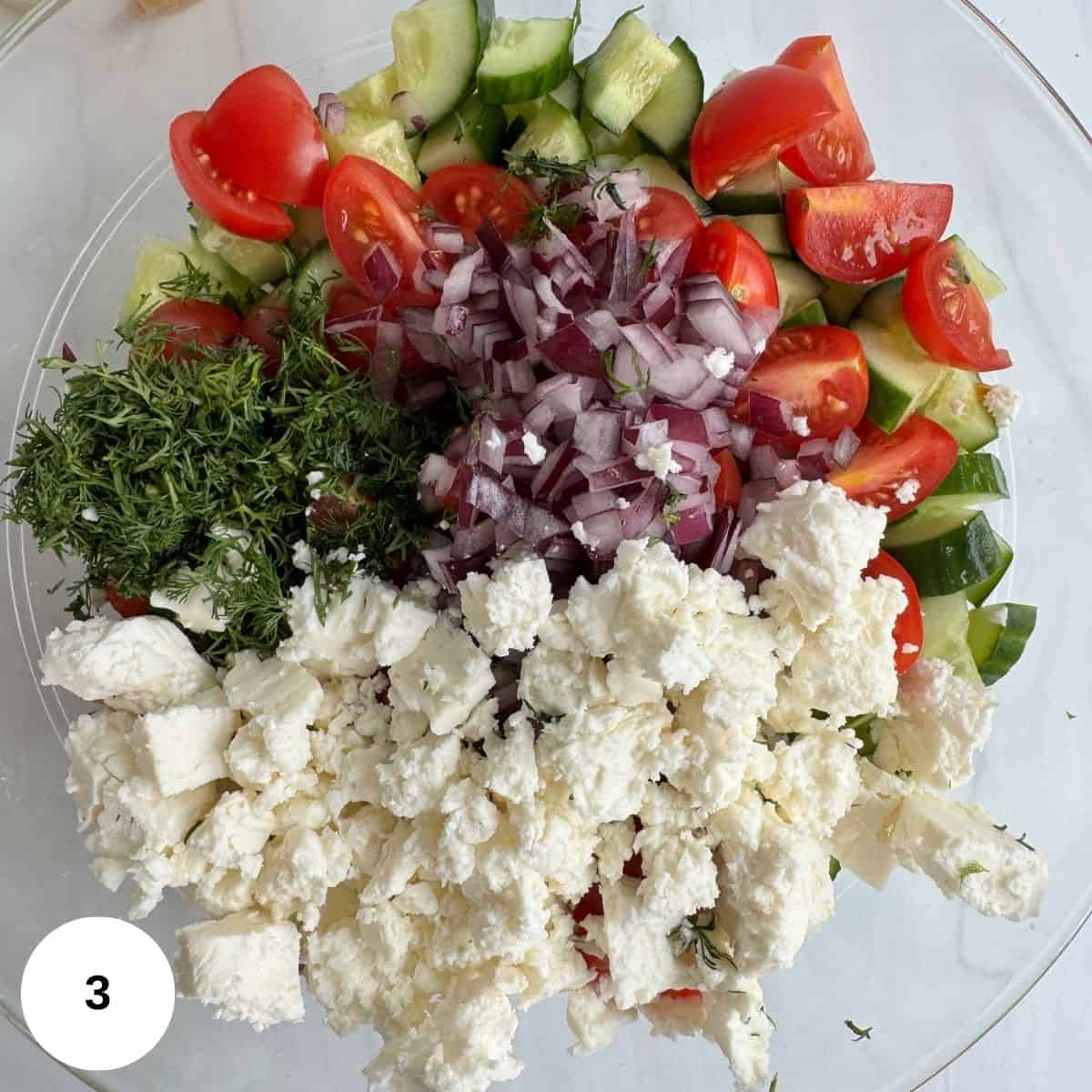 Adding the rest of the vegetables to the bowl.