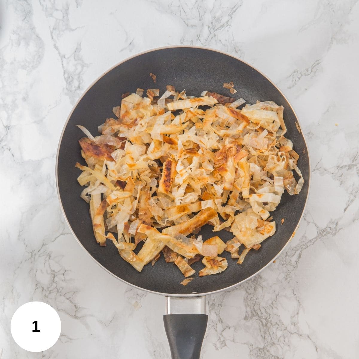 A pan of toasted phyllo strips.