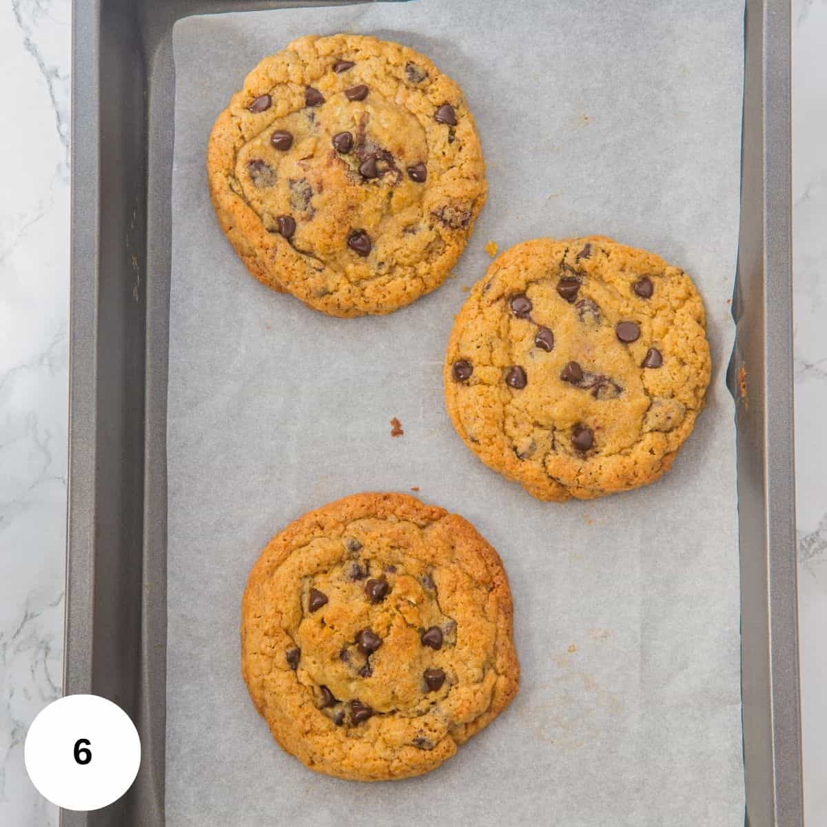 Baking the cookies on a sheet pan.