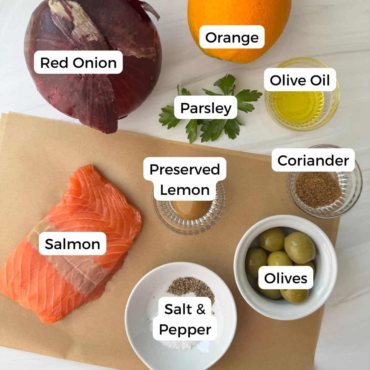 Ingredients include salmon, onion, orange, parsley, preserved lemon, olive oil, coriander, olives, salt, and pepper.