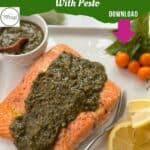 A cooked salmon pesto fillet is served on a white plate with lemon slices and a fork. Cherry tomatoes, basil, and a bowl of pesto are nearby. Text reads: “Baked Salmon Pesto. Download.”.