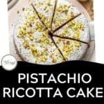 Overhead view of a pistachio ricotta cake, sliced and dusted with powdered sugar and chopped pistachios, alongside a cup of coffee. Text below reads “Pistachio Ricotta Cake” with a download button.