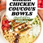 A delicious couscous bowl filled with Greek chicken, chickpeas, tomatoes, cucumbers, tzatziki, and feta cheese. Surrounded by parsley, olives, and tomatoes. Text overlay: Quick & Easy Greek Chicken Couscous Bowls. Grab the recipe!.