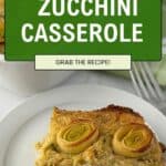 A slice of zucchini kugel casserole topped with spiralized zucchini sits on a white plate. Text reads: “Gluten-free Zucchini Casserole. Grab the recipe!” The background shows more casserole in a baking dish.
