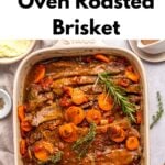 A baking dish filled with oven roasted brisket slices, carrots, tomatoes, and herbs, topped with fresh rosemary, with text reading Oven Roasted Brisket With Wine And Onions.