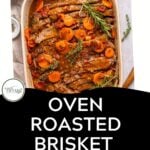 A white baking dish filled with oven roasted brisket, carrots, onions, and herbs in a rich sauce, garnished with fresh rosemary and thyme. Text below reads, Oven Roasted Brisket with Wine and Onions. Download Now.