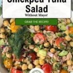 A bowl of chickpea tuna salad with cherry tomatoes, cucumber, parsley, red onion, and dill is displayed under a label reading “Chickpea Tuna Salad Without Mayo! Grab the recipe!” This vibrant chickpea tuna salad makes a fresh and satisfying meal.