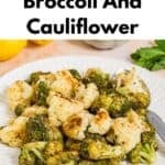 A plate of roasted broccoli and cauliflower topped with crispy breadcrumbs, with lemon and mint in the background. Text reads: Roasted Broccoli And Cauliflower—With Crispy Breadcrumbs, Lemon, & Mint.