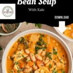 A bowl of Chicken and White Bean Soup with kale, herbs, and vegetables is placed near a bowl of dried herbs. Text reads Chicken & White Bean Soup With Kale with a Download arrow and a recipe seal—perfect for anyone craving the hearty comfort of shredded chicken soup.